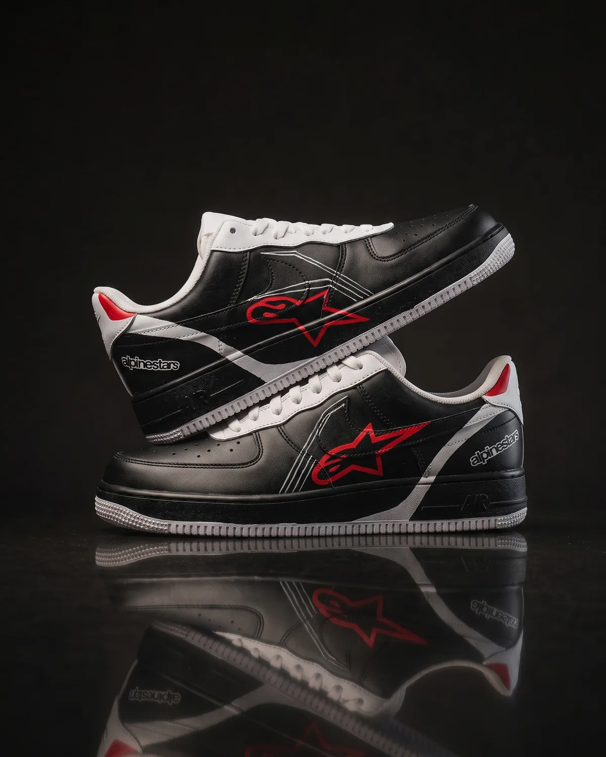 Black Nike Air Force 1 hand-painted with a swept white midfoot panel, fine silver pinstripes, a red star on the quarter and a red heel tab.